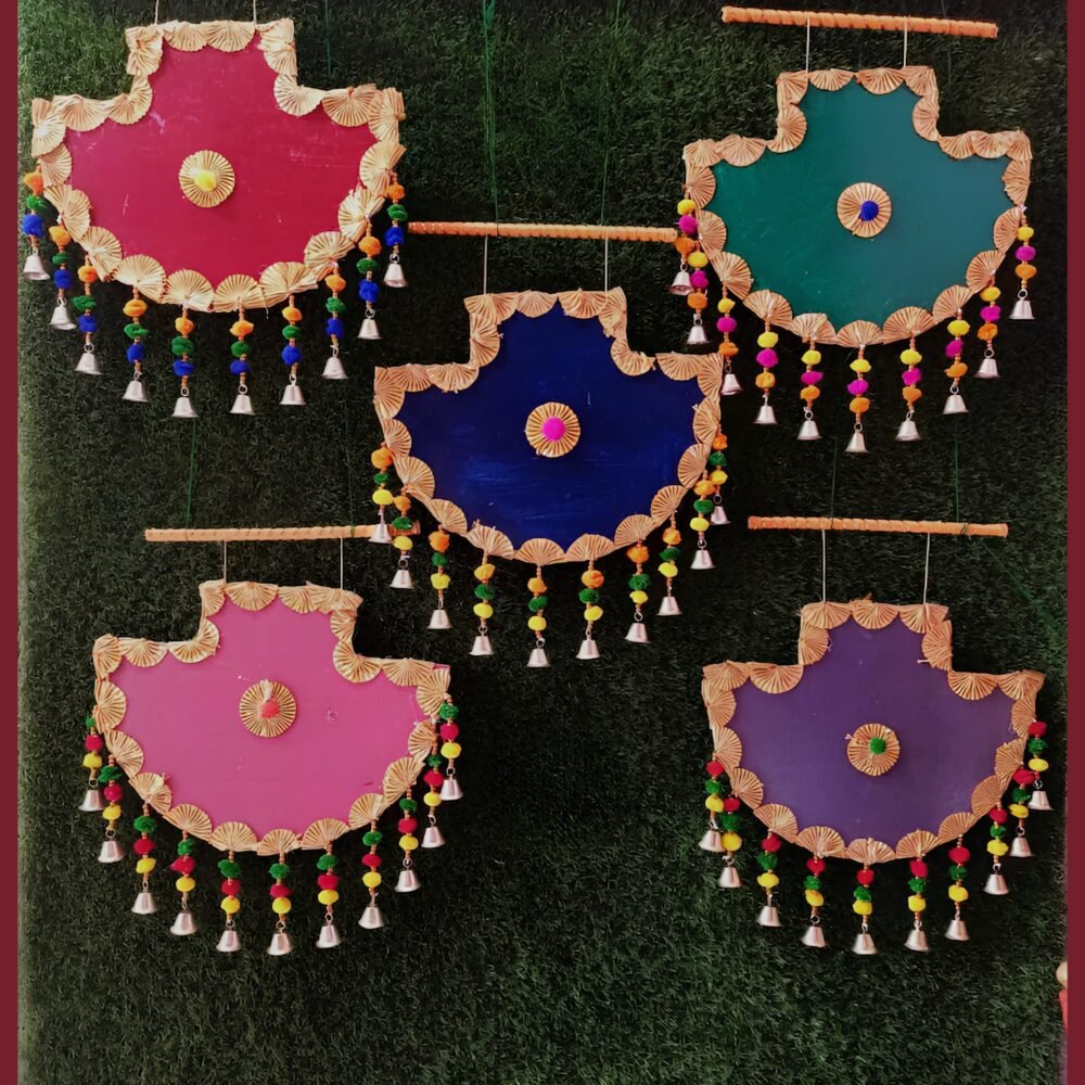 Handmade colorful Indian wall hangings with decorative bells, beads, and woven detailing, displayed on a rustic brick wall. Perfect for Diwali, Navratri, wedding, and home décor.